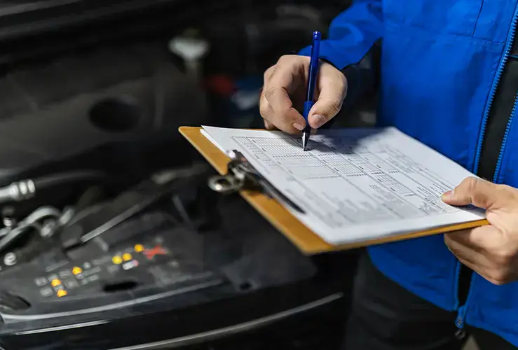 A person with a list on a clipboard
