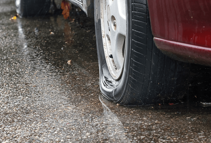 A flat tyre on a car