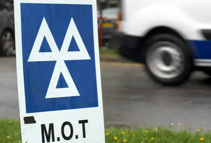 A sign for an MOT centre