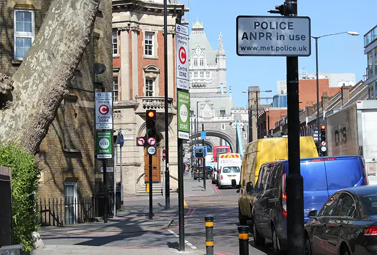 A sign showing congestion charges in London