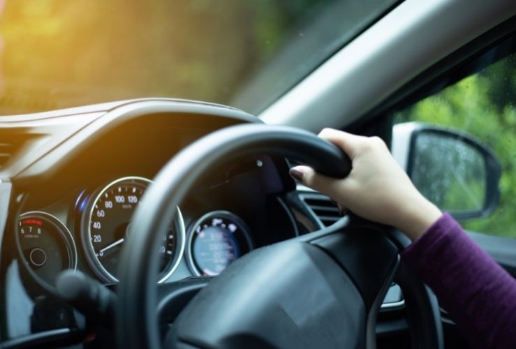 Woman driving UK car in Europe